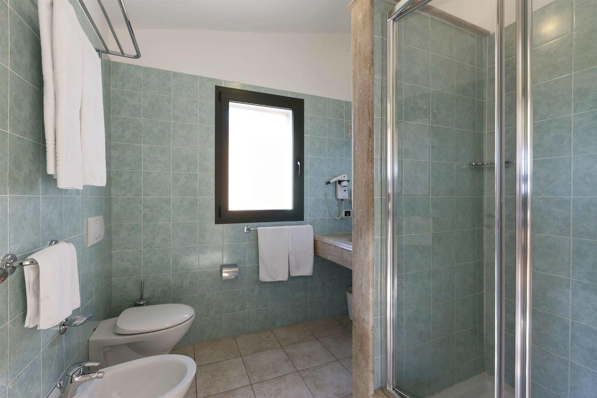 Club Hotel Baia Aranzos Golfo Aranci Eksteriør billede